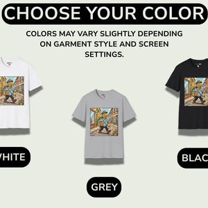K&ouml;nnte beinhalten: Drei T-Shirts in Wei&szlig;, Grau und Schwarz mit einer Cartoon-Illustration einer Person, die eine Stra&szlig;e entlanggeht. Der Text "CHOOSE YOUR COLOR" steht oben, mit den Etiketten "WHITE", "GREY" und "BLACK" darunter. Der Text "COLORS MAY VARY SLIGHTLY DEPENDING ON GARMENT STYLE AND SCREEN SETTINGS" ist ebenfalls vorhanden.