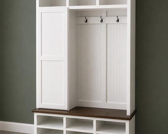 May include: A white wooden entryway organizer with a dark brown bench seat. It features open shelves, a cabinet, and hooks for hanging items. The top has open cubbies for storage. The unit is against a dark green wall.
