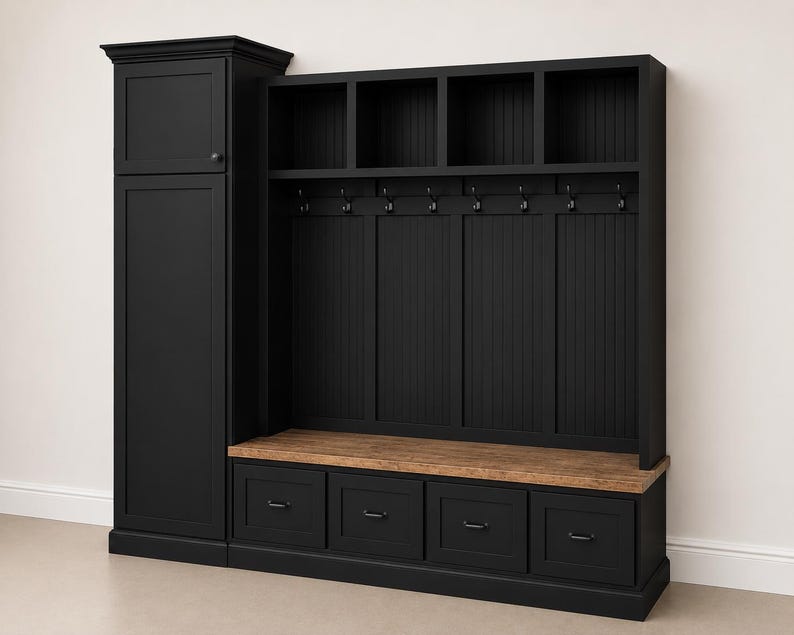 May include: A black wooden entryway organizer with a cabinet, open shelves, coat hooks, and drawers. The bench seat is made of light brown wood. The organizer is against a white wall.