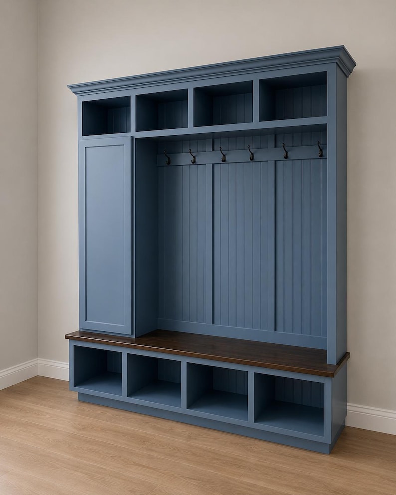 May include: A blue wooden entryway storage unit with multiple compartments, hooks, and a bench. The unit has a dark brown bench seat and a series of open cubbies at the top. The unit is painted in a muted blue color.