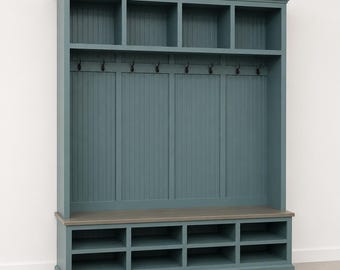May include: A teal-colored entryway organizer with multiple storage compartments. It features open shelves at the top, six coat hooks, and a bench with shoe cubbies. The unit is painted in a matte finish and has a contrasting gray bench top.