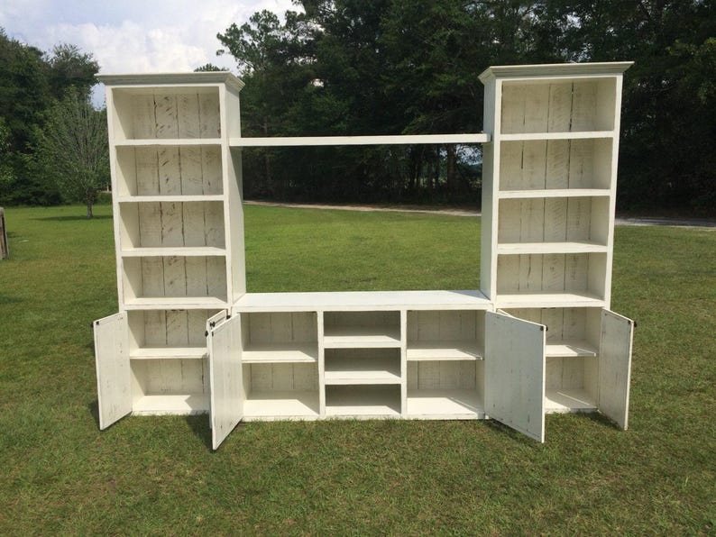 Tv stand with lots of shelves