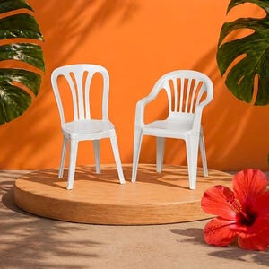 May include: Two white plastic chairs, one with armrests, sit on a wooden platform against an orange backdrop. Large green leaves and a vibrant red hibiscus flower frame the scene, creating a tropical aesthetic. The chairs are simple in design, suitable for outdoor use.