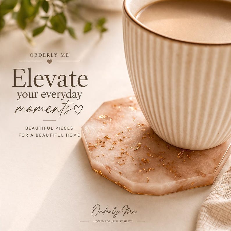 May include: A cream-colored mug with a beverage rests on a hexagonal coaster. The coaster is a blend of pink and white with gold flecks. The image includes the text "Elevate your everyday moments" and "Beautiful pieces for a beautiful home."