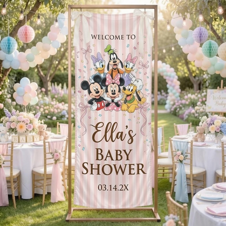 May include: A vertical banner with a light pink and white striped background featuring the text "WELCOME TO", "Ella's BABY SHOWER", and "03.14.2X". The design includes illustrations of Mickey Mouse, Minnie Mouse, Donald Duck, Daisy Duck, Goofy, and Pluto.