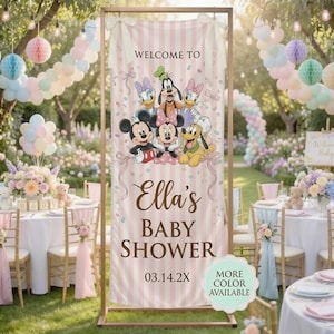 May include: A vertical rectangular banner with a light pink and white striped background featuring cartoon characters including Mickey Mouse, Minnie Mouse, Donald Duck, Daisy Duck, Goofy, and Pluto. The text reads WELCOME TO Ella's BABY SHOWER 03.14.2X.