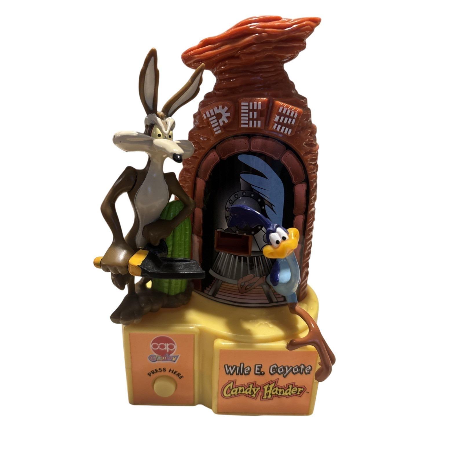Wile E. Coyote on a rocket statue | #1849619256