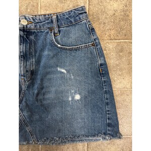 BDG Urban Outfitters Distressed Denim Mini Skirt Medium Wash Raw Hem Womens L image 3