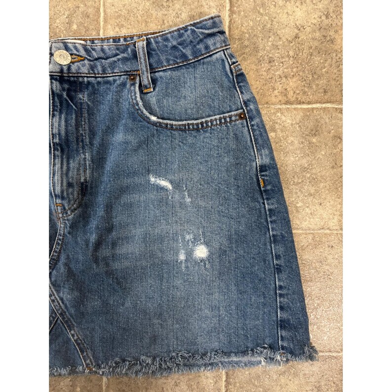 BDG Urban Outfitters Distressed Denim Mini Skirt Medium Wash Raw Hem Womens L image 3