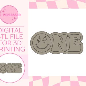 May include: A taupe-colored cookie cutter featuring a smiley face with lightning bolt eyes inside a circle, followed by the word ONE in a wavy, bold font. The text SO IMPRESSED, DIGITAL STL FILE FOR 3D PRINTING is visible on the left side.
