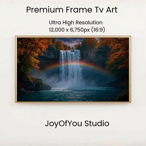 May include: Premium Frame Tv Art with text reading Premium Frame Tv Art, Ultra High Resolution, 12,000 x 6,750px (16:9), and JoyOfYou Studio. The image displays a waterfall scene with a rainbow, autumn trees, and a thin wooden frame.