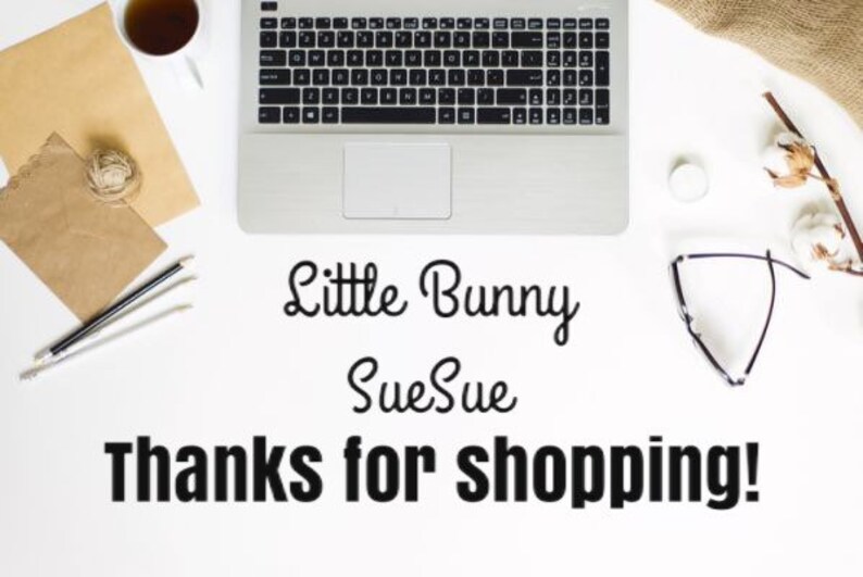May include: A white desk with a laptop, stationery, and a cup of tea is shown from above. The text "Little Bunny SueSue Thanks for shopping!" is displayed in black.