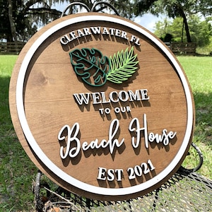 Custom wooden beach house sign with 3D lettering. Personalized wood beach house sign with your custom text, great for housewarming or closing gifts.