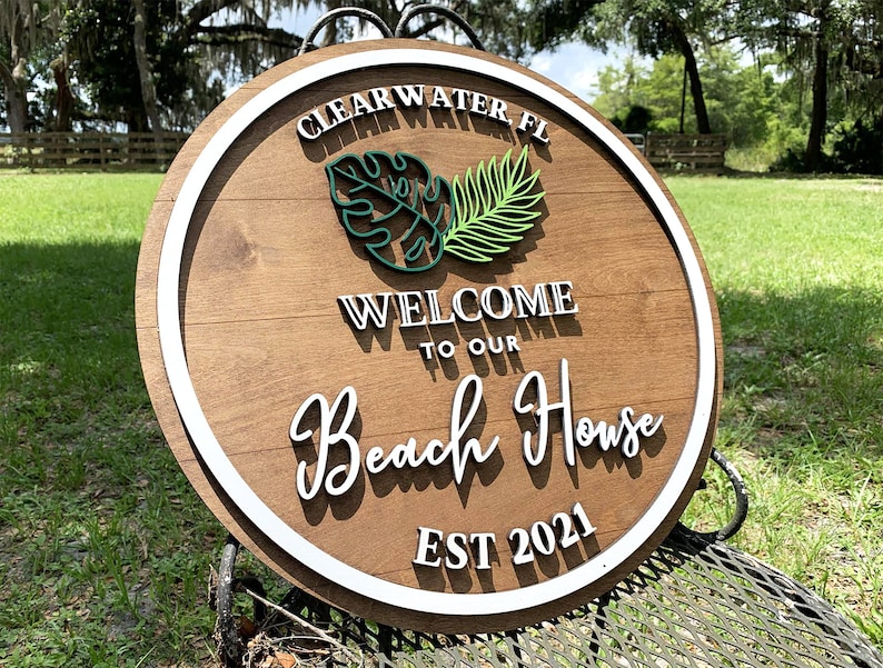 Custom wooden beach house sign with 3D lettering. Personalized wood beach house sign with your custom text, great for housewarming or closing gifts.