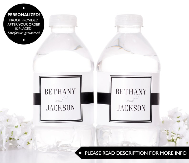 May include: Two clear plastic water bottles with black and white personalised labels. The labels have a black stripe and the text "Bethany and Jackson".