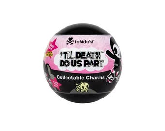 May include: A spherical black and pink container for Tokidoki Til Death Us Part collectable charms. The packaging features a skull graphic, the text 'Til Death Us Part', 'Collectable Charms', and a pink starburst label that reads 'Chase Model Glow in the dark!!'.