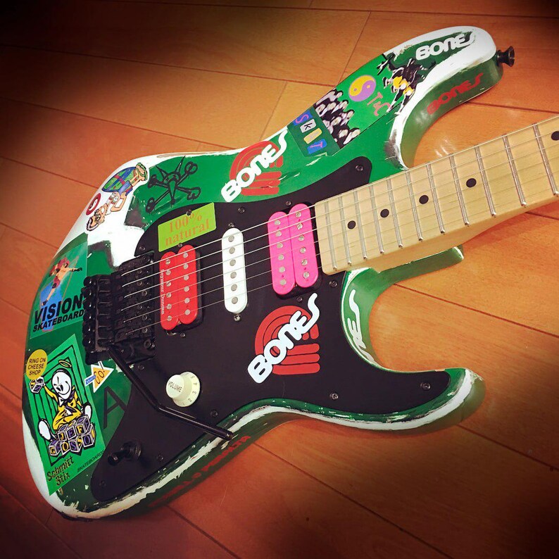 May include: A rustic wooden sign with the text "Welcome to our home" in white lettering. The sign has a distressed finish and a simple, inviting design, ideal for front door decor.