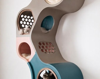 Casas modulares de pared de primera calidad para gatos, modernas estructuras multinivel para trepar y estantes flotantes para mascotas con lujosas cápsulas para dormir.