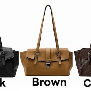 May include: Three leather tote bags in black, brown, and coffee colours. Each bag has a flap closure with a silver-tone buckle, adjustable shoulder straps, and a top handle. The words "Back", "Brown", and "Coffee" are written below each bag.