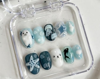 Uñas postizas con diseño de foca arpa y océano, color azul claro, para pegar, set de uñas Kawaii.