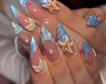 Uñas postizas hechas a mano con diseño de océano azul pastel, estrellas de mar 3D, vida marina Kawaii.