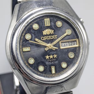 Rare vintage Orient Day Date 21 jewels no. 46941A japan  made men's watch free shipping.