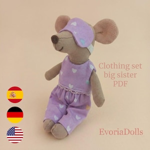 May include: A plush mouse doll with light brown fabric skin, wearing a lavender sleeveless top and matching pants featuring a white heart pattern. The mouse has a lavender sleep mask over its eyes and the text Clothing set big sister PDF EvoriaDolls.
