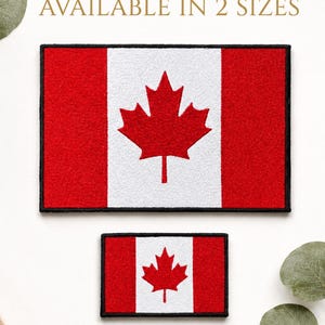 May include: Two embroidered patches featuring the Canadian flag. The patches have a red maple leaf on a white background, flanked by red vertical stripes. The text "AVAILABLE IN 2 SIZES" is at the top.