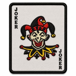 May include: Embroidered patch featuring a Joker card design. The card has a white background with the word "JOKER" in black on the sides. The Joker character is depicted with a smiling face, wearing a red and black jester hat.