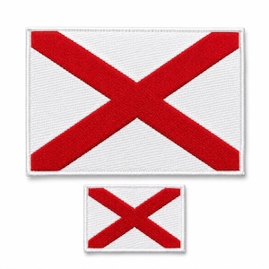 May include: Two rectangular patches featuring the Alabama state flag. The larger patch measures approximately 4 inches by 2.5 inches, and the smaller patch is about 2 inches by 1.25 inches. Both have a white background with a red X-shaped cross.