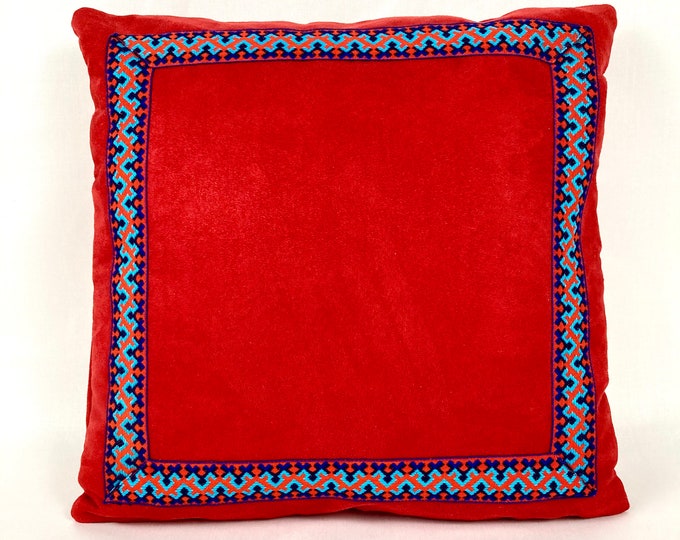 Red microsuede pillow cover with trim