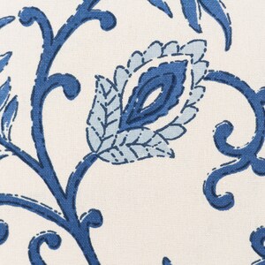 May include: Blue and white floral fabric with a paisley design. The fabric features a repeating pattern of leaves and flowers.