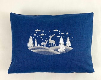 Blue white embroidered winter scene