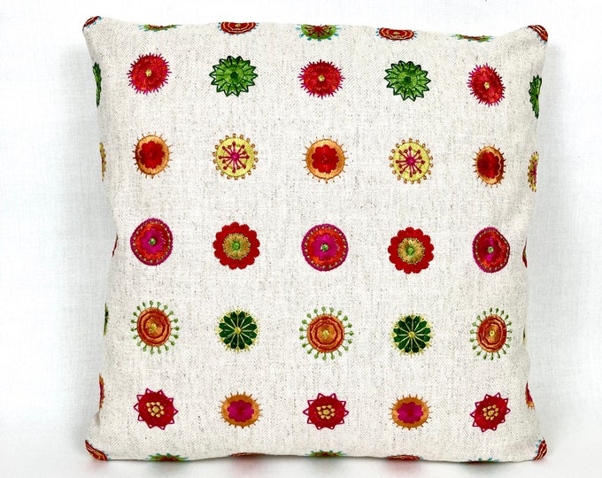 Embroidered circles and flowers pillow cover