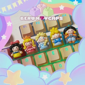 May include: A keyboard with custom keycaps featuring cartoon princess designs. The keycaps are in various colors, including yellow, pink, blue, and orange. The text "BERU KEYCAPS" is displayed above the keys. The background is decorated with stars and clouds.