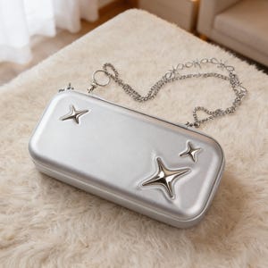 Metallic zilveren Star Switch-behuizing met ketting, Cybercore Switch OLED-tas, Y2K Chrome Starburst-etui, futuristisch hard-shell gameraccessoire