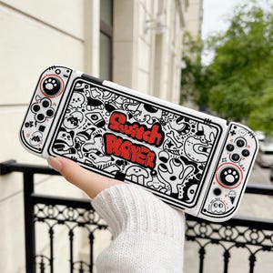 Puede incluir: Un juego de tres tazas de cerámica con un acabado mate moteado. Las tazas son de color crema, gris claro y gris oscuro. Cada taza tiene un diseño simple y minimalista y un asa redondeada.