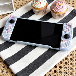 Funda suave con orejas de gato 3D para Switch 1, Switch 2 y Switch OLED, funda para consola Kawaii Lila Pastel Neko, agarre cómodo para gamers.