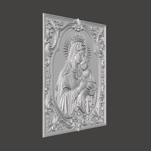May include: A silver-toned rectangular wall plaque featuring a three-dimensional relief of a figure holding a child. The central oval panel is surrounded by an ornate, scrolling border with floral motifs. The figures wear crowns and halos.
