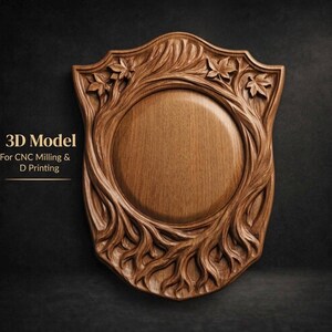 May include: A shield-shaped wooden plaque with a central circular area, surrounded by carved tree branches and leaves. The plaque has a dark brown color and the text "3D Model For CNC Milling & D Printing".