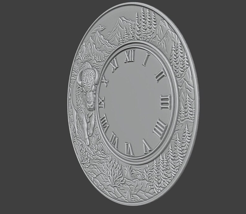 May include: A grey, circular wall clock with a detailed relief design. The clock face features Roman numerals and is surrounded by a border with a bison, mountains, and trees. The clock has a diameter of approximately 30 cm.