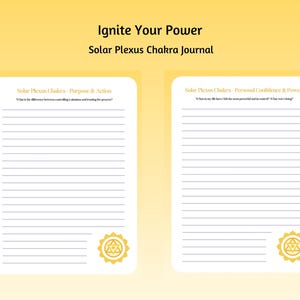May include: Two-page journal with the text "Ignite Your Power" and "Solar Plexus Chakra Journal". Each page has lined paper with a gold emblem at the bottom. The left page is titled "Purpose & Action" and the right page is titled "Personal Confidence & Power".