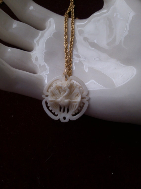 REDUCED Carved Disc with Peacock ,30" Chain