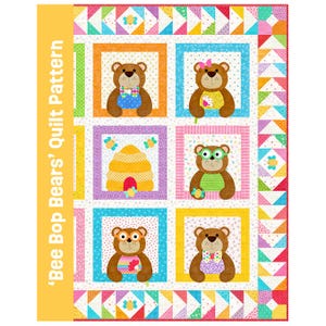 May include: A quilt pattern titled Bee Bop Bears Quilt Pattern featuring a grid of six squares. Each square contains a brown bear or a beehive illustration. The border consists of colourful triangles and small bee motifs.