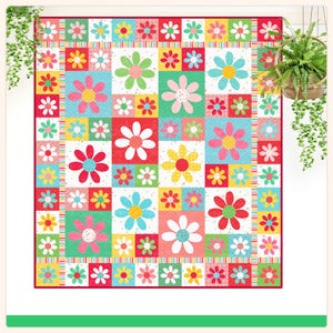 Pode incluir: Uma colcha de retalhos quadrada com um padrão floral repetitivo de margaridas multicoloridas em tons de vermelho, rosa, amarelo, azul e verde. O design consiste em blocos de vários tamanhos dispostos numa grelha, contornados por uma borda fina às riscas.