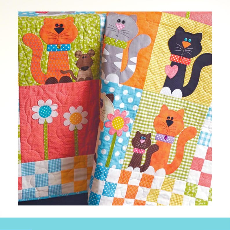 May include: A quilted fabric blanket featuring colorful patchwork squares with appliqued cats, a mouse, and flowers. The design includes orange, gray, and black cats with patterned collars, a small brown mouse, and white daisies on a coral background.