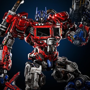 Peut inclure: Figurine détaillée d'Optimus Prime, le chef des Autobots, dans une pose dynamique. La figurine est principalement rouge et bleue, avec des accents argentés et noirs. Le robot a une conception mécanique détaillée, avec des pistons, des tuyaux et des panneaux visibles. Le fond est bleu foncé.