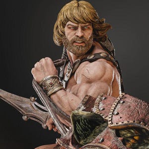 May include: A detailed statue of a muscular figure with blonde hair and a beard, wearing ornate armor and holding a weapon. The figure has a determined expression, with a focus on the face and upper body. The armor is detailed with metallic accents.