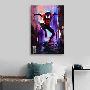 May include: A canvas print featuring a dynamic illustration of a superhero in a black and red suit, leaping through a city street. The artwork uses a vibrant color palette of purples, blues, and reds, with a stylized, painterly effect. The superhero's emblem is visible on the chest.