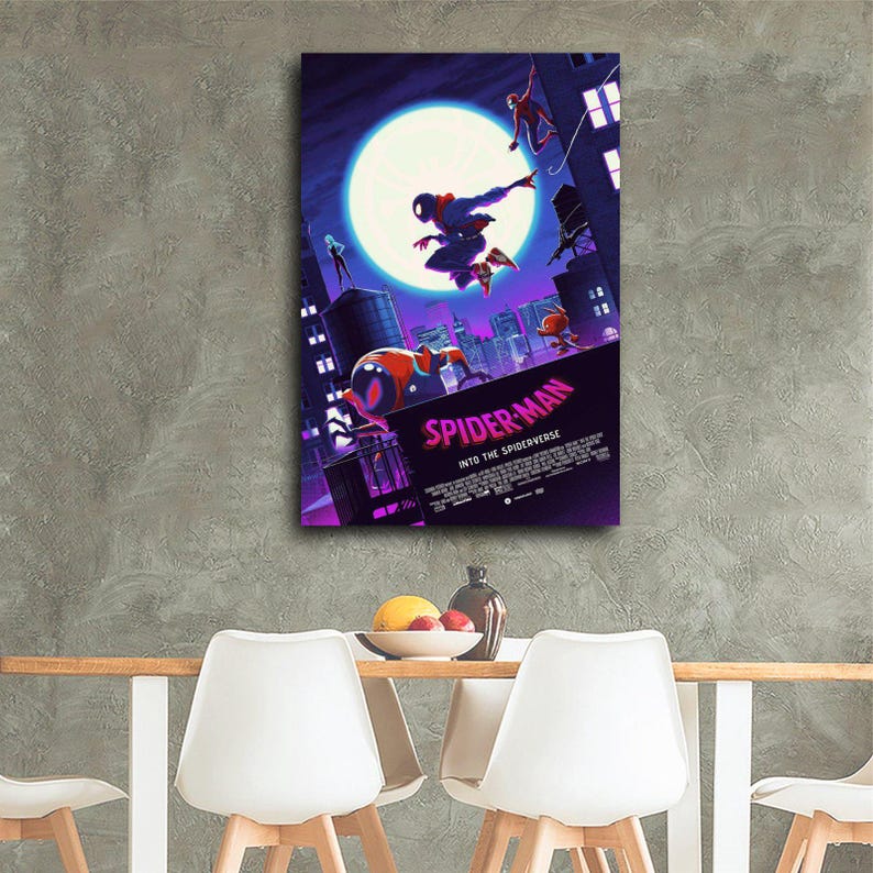 May include: A framed poster featuring the animated film "Spider-Man: Into the Spider-Verse." The artwork depicts Spider-Man in action against a cityscape backdrop, with a large moon in the sky. The poster has a purple and blue color scheme.